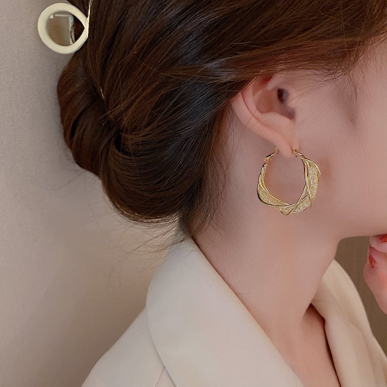 🔥 49% KORTING – Mode Twist Oorbellen
